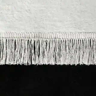 Eurofirany Koc DUO dwukolorowy bawełniano-akrylowy z frędzlami, dwustronny 150x200cm biały, czarny