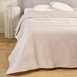 Jednokolorowa narzuta na łóżko z wytłoczonym wzorem Trialett