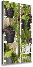 Foto obraz na płótnie do salonu pionowy Kwietnik