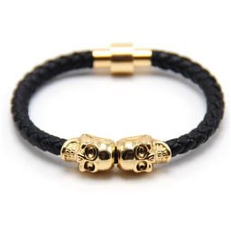 Męska bransoletka biżuteria czarne plecione z czaszkami złoty