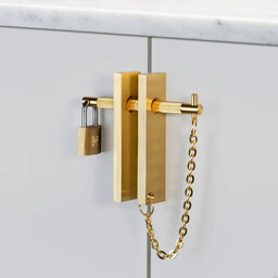 Uchwyt meblowy z zamkiem Precious Bar Linear Mosiężny