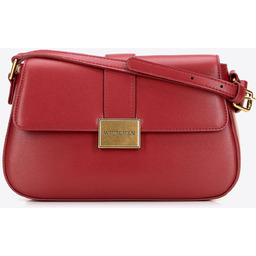 Mała listonoszka ze skóry naturalnej z ozdobnym zapięciem