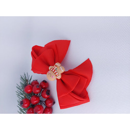 Czerwona kokardka świąteczna z piernikowym ludkiem na spince