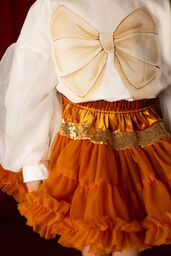 Tiulowa spódniczka z falbanami i cekinami "Złota tutu"