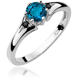 Złoty pierścionek Topaz London Blue 0,50ct białe złoto