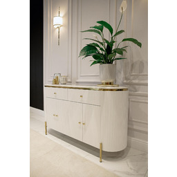 KOMODA Anne biała, ryflowana na złotych metalowych nóżkach,