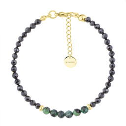 Bransoletka z czarnymi turmalinami i zielonymi szmaragdami.