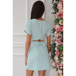 Sukienka z wycięciem i kokardą miętowa Dilia