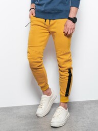 Spodnie męskie dresowe z przeszyciami - żółte V7