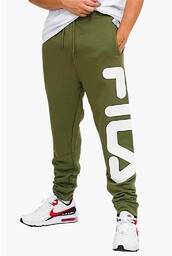 Dresowe spodnie marki Fila model FAU0093 kolor Zielony.