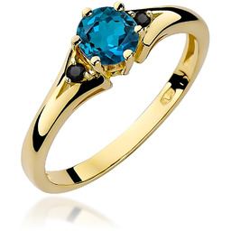 Złoty pierścionek Topaz London Blue 0,50ct żółte złoto