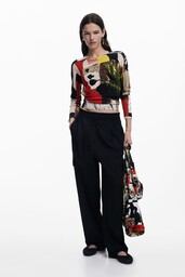 Sweter zaprojektowany przez Mr. Christian Lacroix