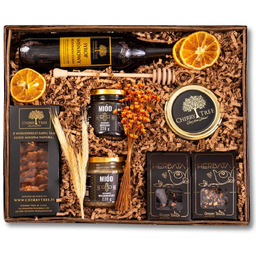 Kosz prezentowy herbaty syrop wiśniowy miody konfitura ciastka