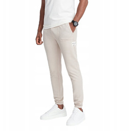 Męskie spodnie dresowe z dzianiny jasnobeżowe V1 OM-PASK-0211