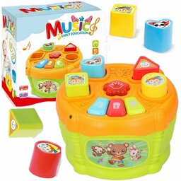Muzyczny garnuszek na klocuszek sorter bębenek kolory kształty