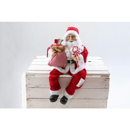 Mikołaj siedzący z workiem i lizakami 45 cm