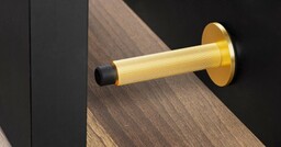 Stopka Stoper do drzwi naścienny Arpa Aluminiowy Złoty