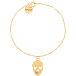 Pozłacana bransoletka z czaszką
