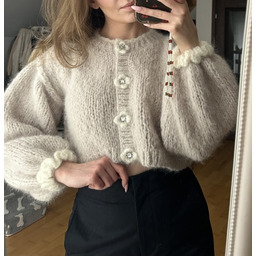 Pakamera Kardigan Fleur marcepan kwiaty koronki falbanki ozdobne