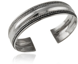 Elegancka szeroka oksydowana srebrna bransoleta ze wzorem warkocz