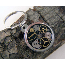 Pakamera Mechaniczny brelok z otwieraczem do butelek 28