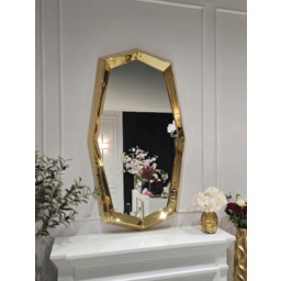 LUSTRO ŚCIENNE Monolith o geometrycznym kształcie, złota rama