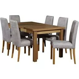 Rozkładany drewniany stół z tapicerowanymi krzesłami