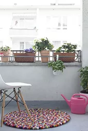 Kolorowy okrągły dywan na balkon Kolorowy okrągły dywan na balkon