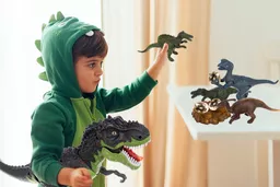 Interaktywny dinozaur widok na bawiące się dziecko