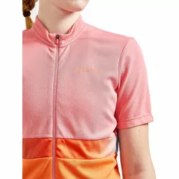 Koszulka rowerowa Craft różowo pomarańczowa ze stójką pod szyją Koszulka rowerowa Craft różowo pomarańczowa ze stójką pod szyją