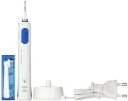Szczoteczka elektryczna do zębów Oral B Pro 600 D16 513 3D White biała prezentacja wymiennej końcówki wraz ze stacją ładującym