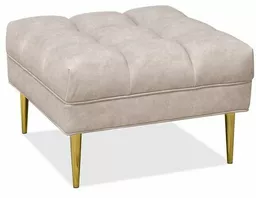 Elegancka pufa do salonu Deco tapicerka w kolorze szarego beżu na stalowych nóżkach w kolorze złota Elegancka pufa do salonu Deco tapicerka w kolorze szarego beżu na stalowych nóżkach w kolorze złota
