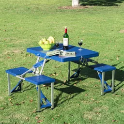 Stół ogrodowy plastikowy rozkładany Ezze niebieski prezentacja na trawie
